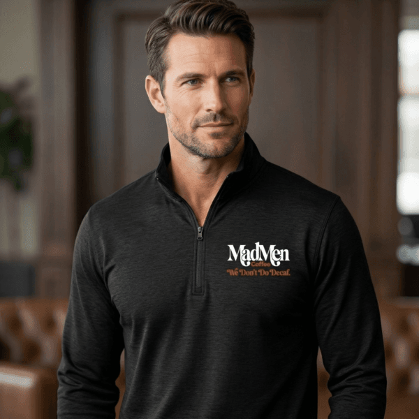 Man wearing the black MadMen Coffee premium tri-blend quarter-zip pullover